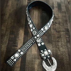 Black leather studded jeweled belt.